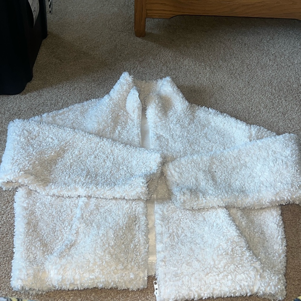 White furry coat